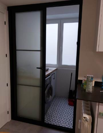 Cocina corredera negra